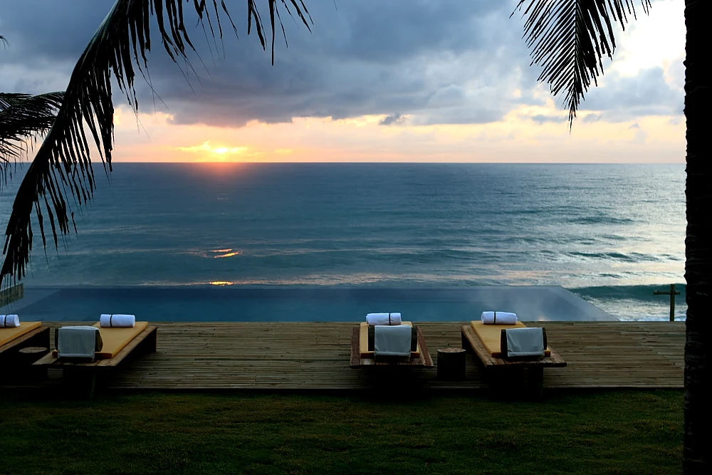 BR - Kenoa Exclusive Beach Resort - Deck at sunrise.webp