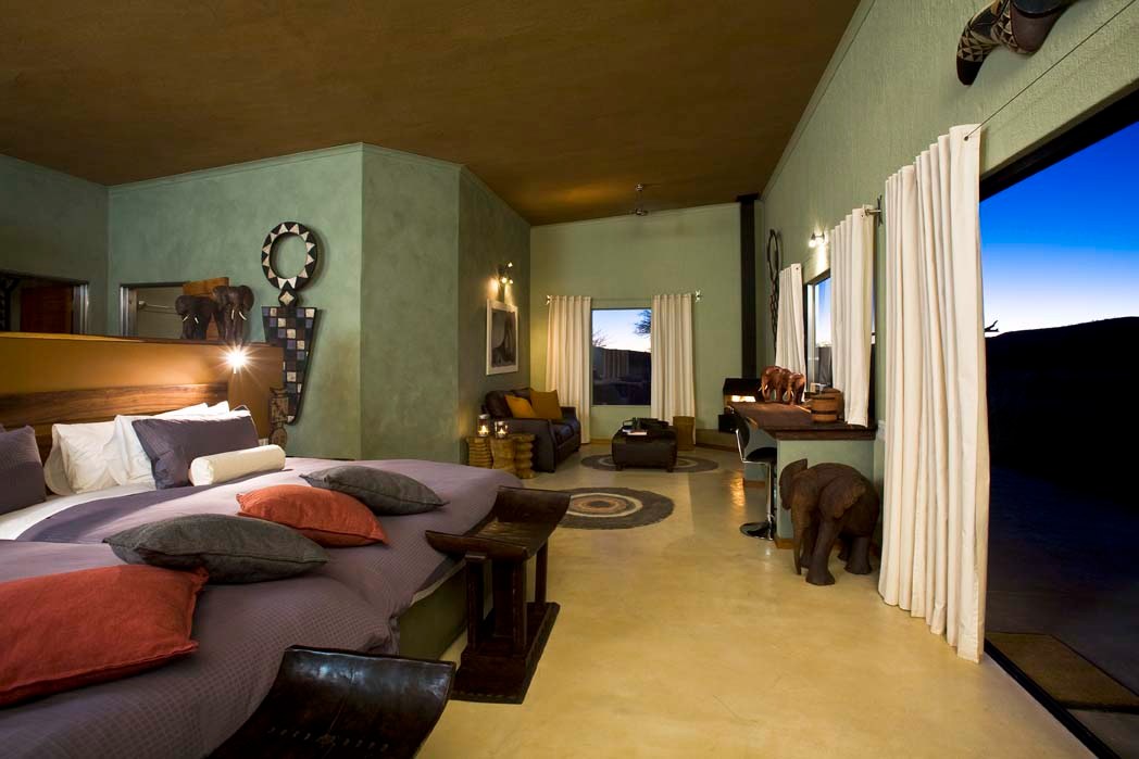 NA - Okonjima Luxury Bush Camp - Bedroom interior.jpg