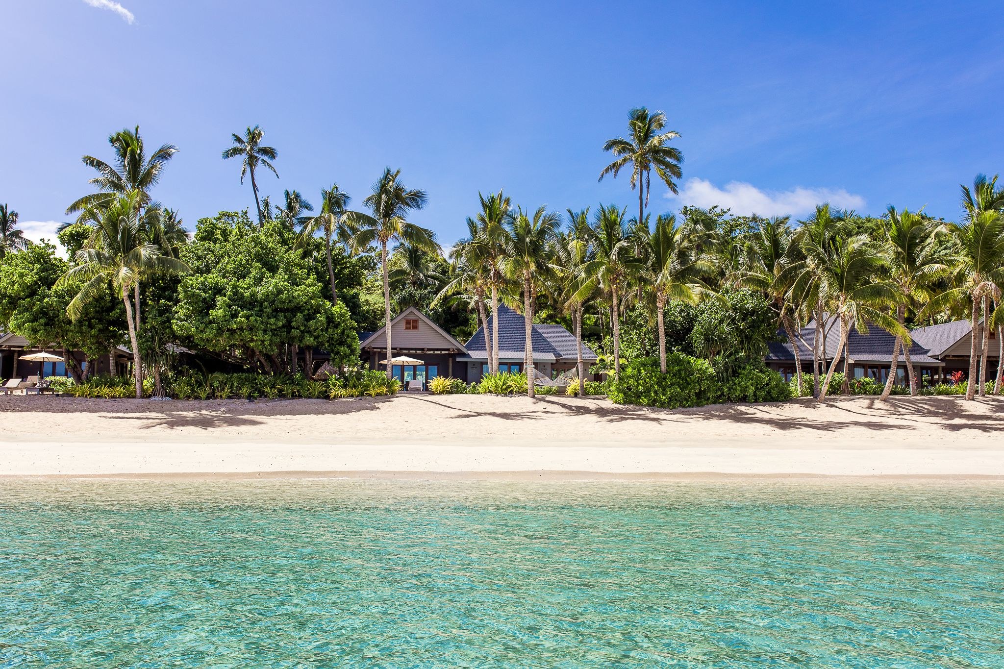 FJ - Accommodatie - Kokomo Private Island - Sunset Villa shot from the Ocean.jpg