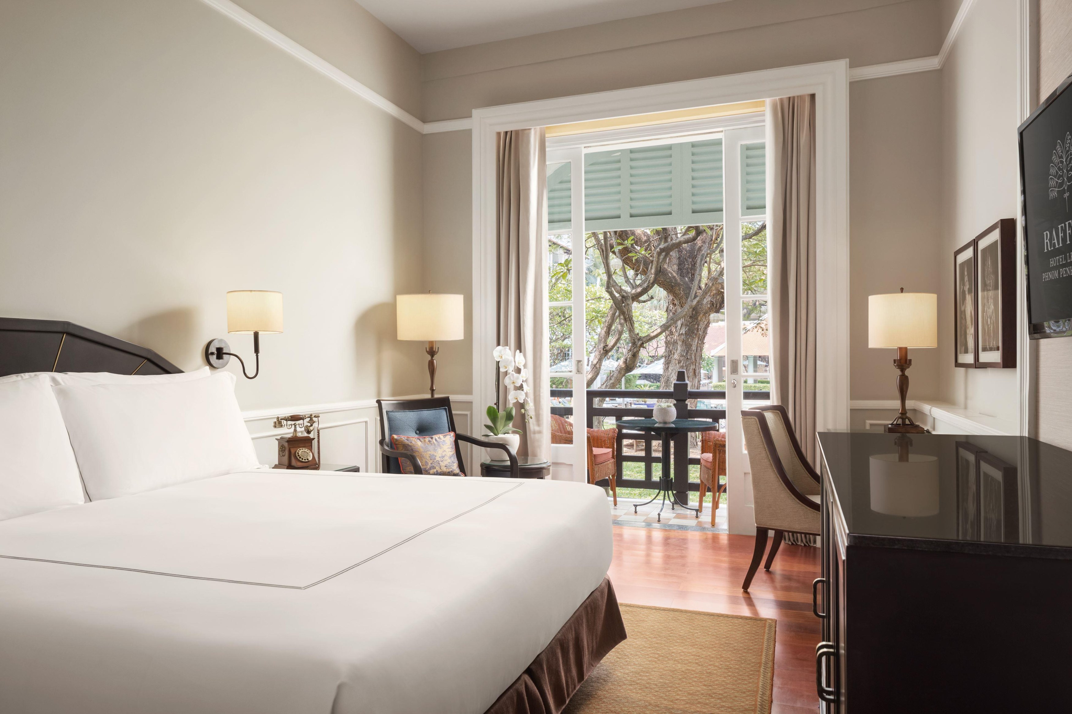KH - Raffles le Royal - State Room Pool View Bedroom.jpg