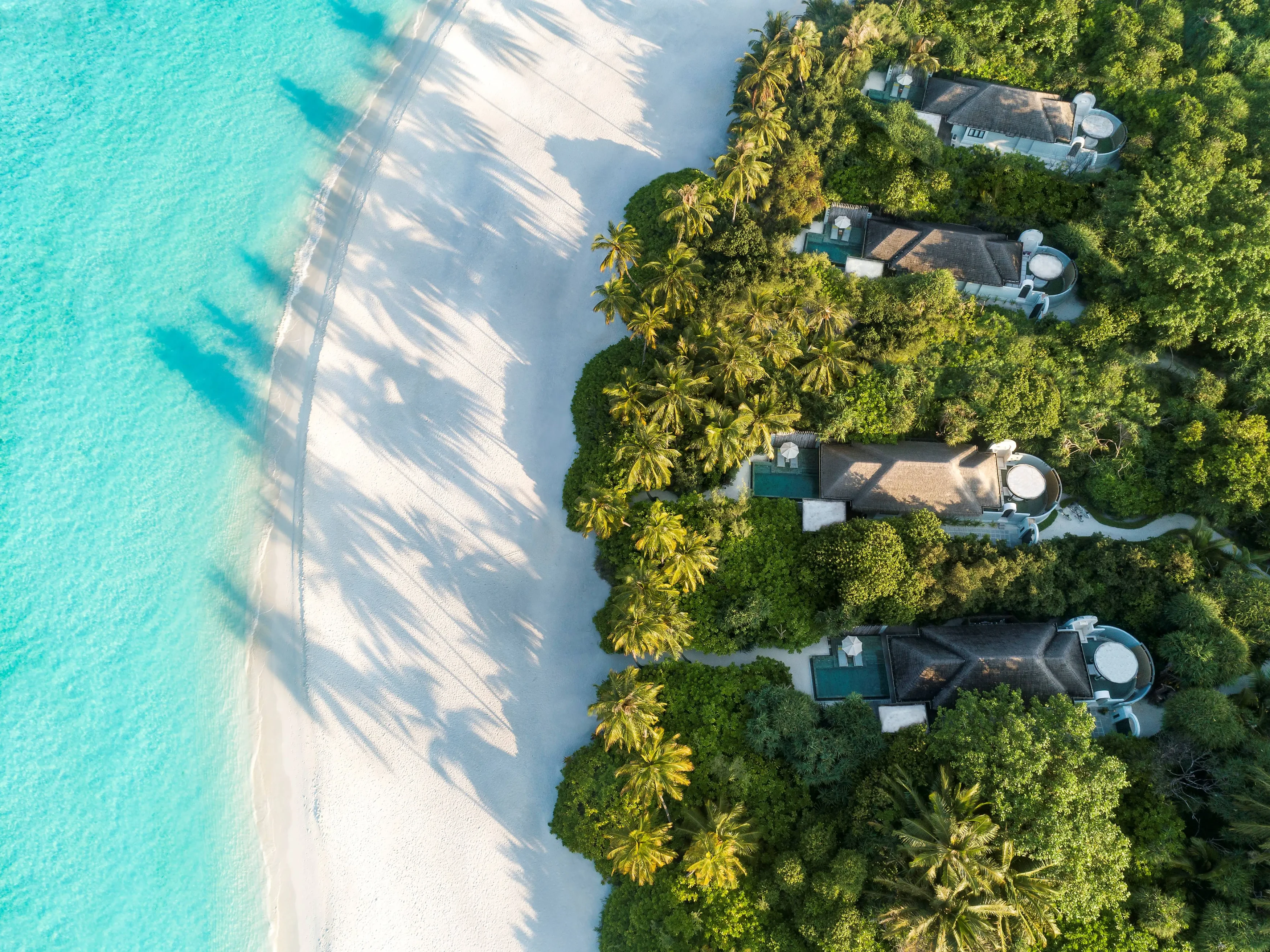 Anantara Kihavah Beach Pool Villas Horizontal Aerial.webp