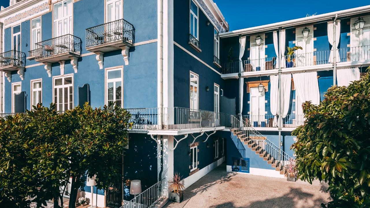 PT-Torel-Palace-Blue-Building-exterior-facade.jpg