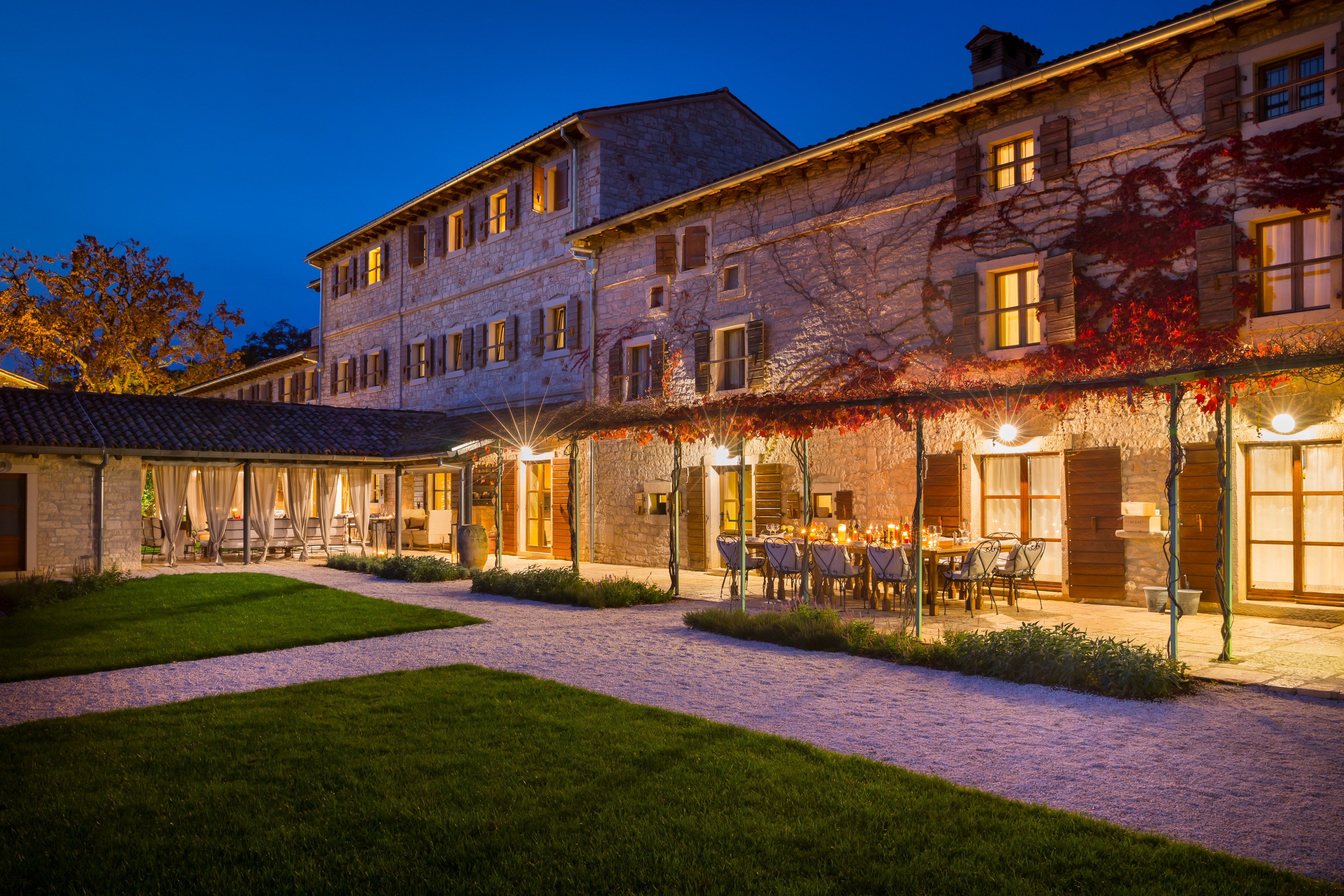 HR - Meneghetti Wine Hotel - Patio Evening.jpg