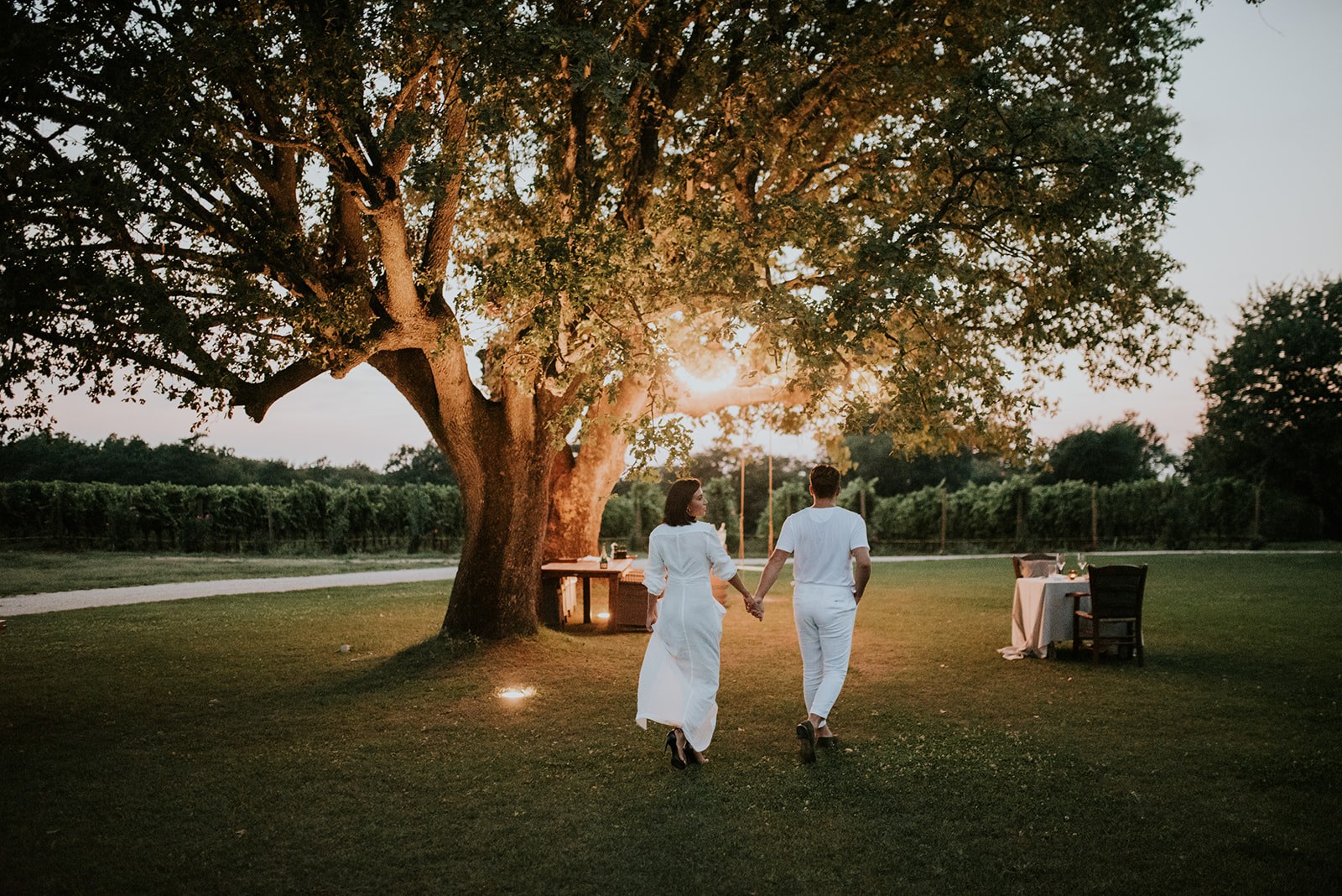 HR-Meneghetti Wine Hotel- couple in garden.jpg