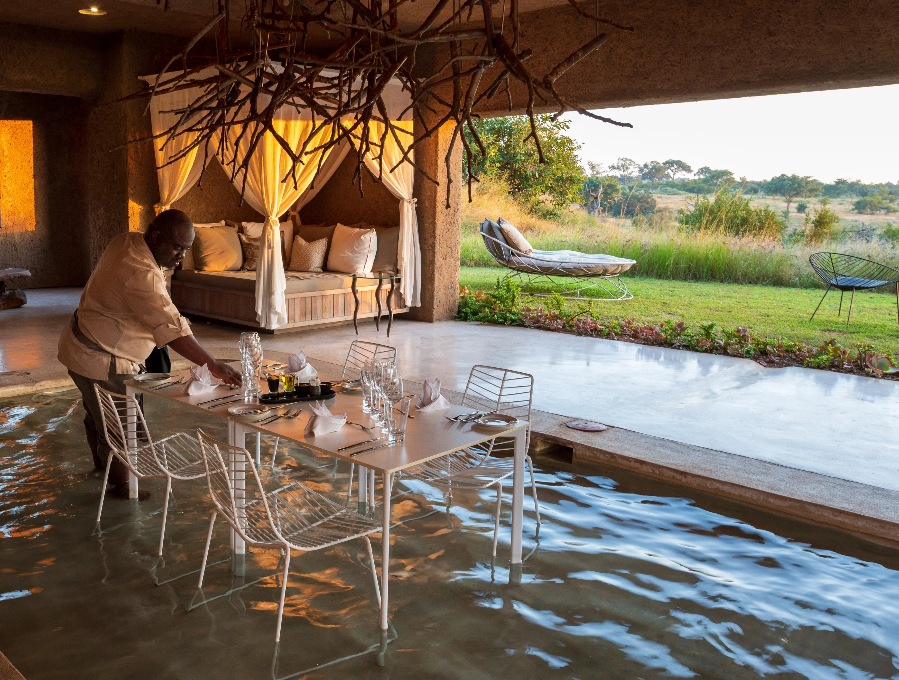 ZA-Sabi Sabi Earth Lodge-table in water.webp