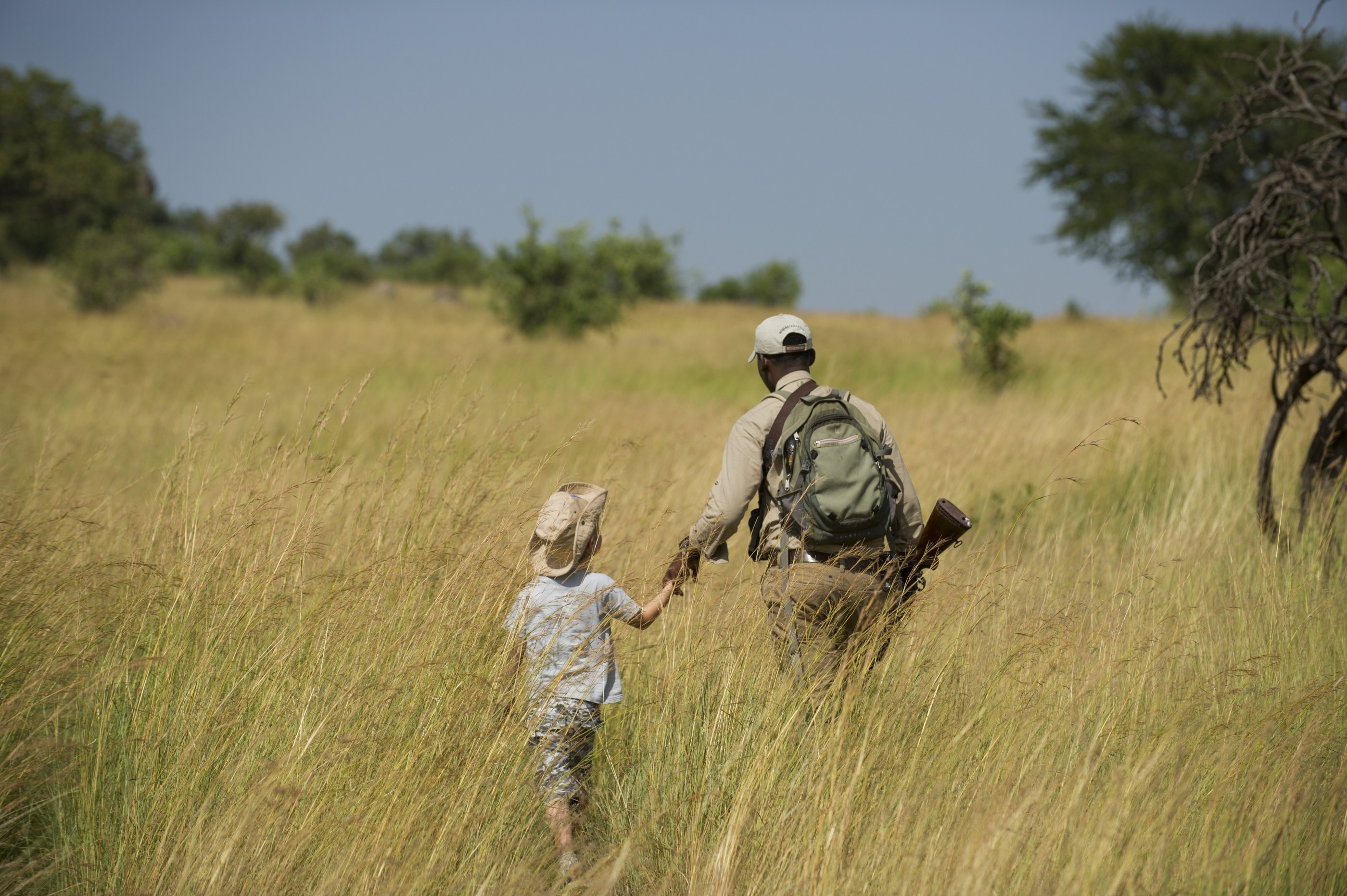 TZ - Mkombes house - Guide with Child.jpg