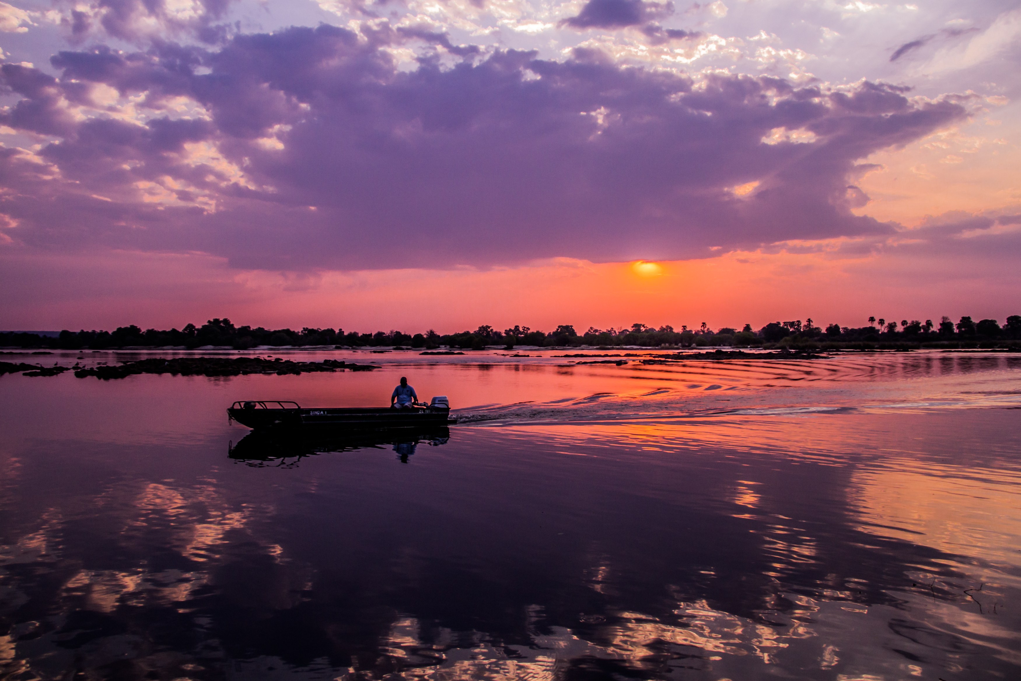 ZM-Tongabezi-boat at river.jpg