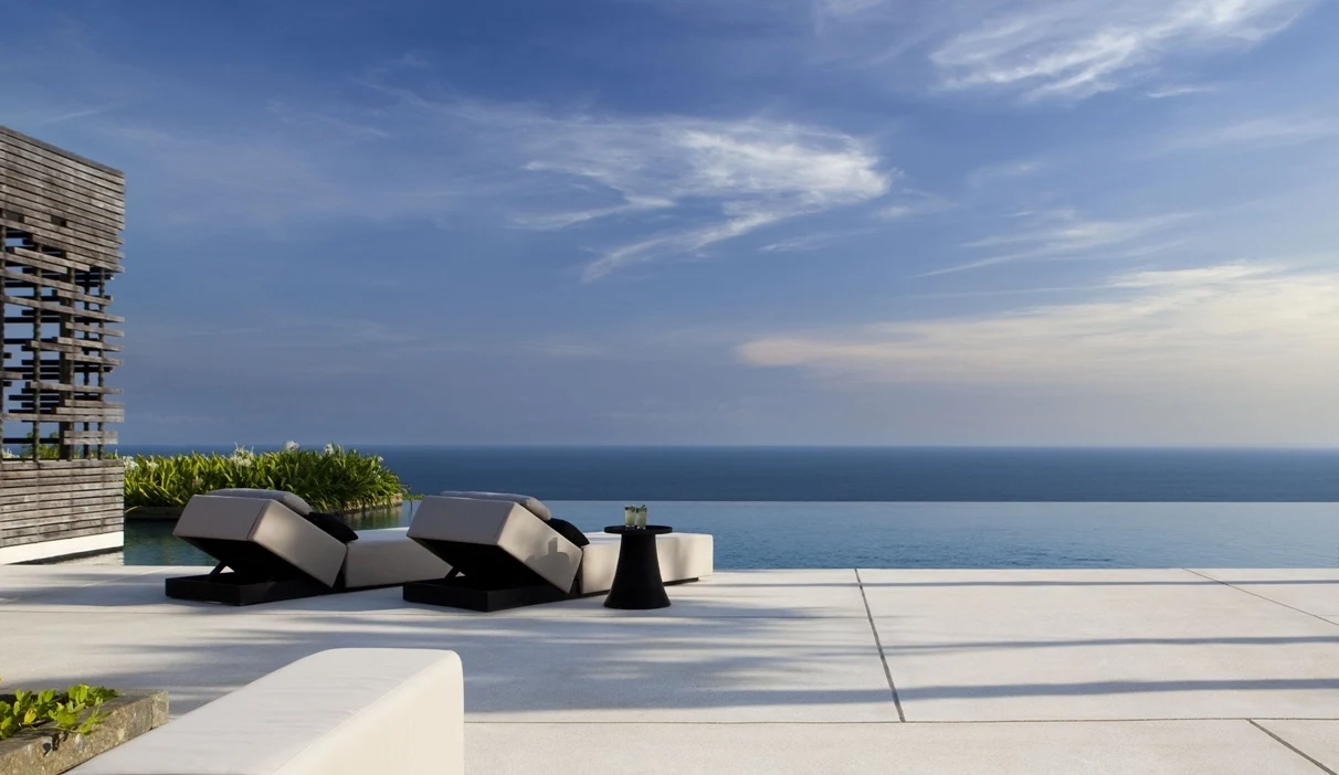 ID-Alila UluwatuPool view from lobby living room.webp