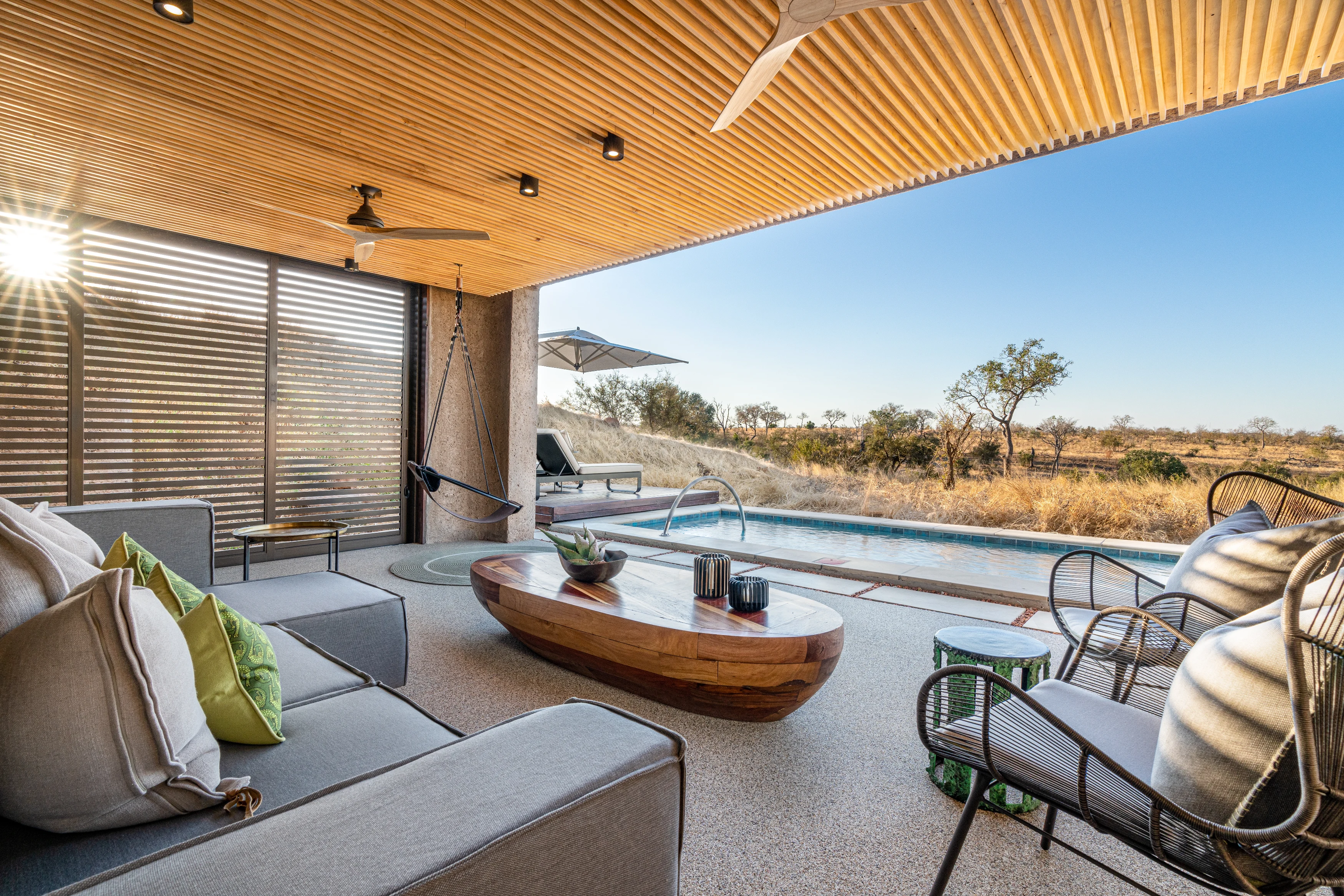 ZA-Sabi Sabi Earth Lodge-Suite_Terrace_Lounge.webp