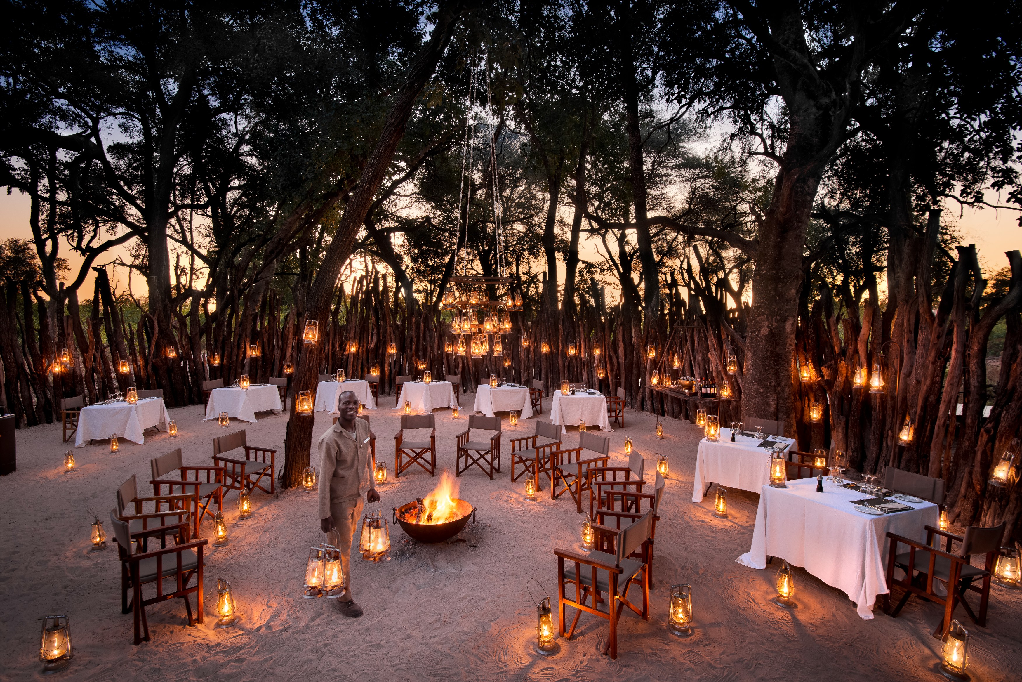 BW-Nxabega Okavango Tented Camp-Outdoor dining boma.jpg