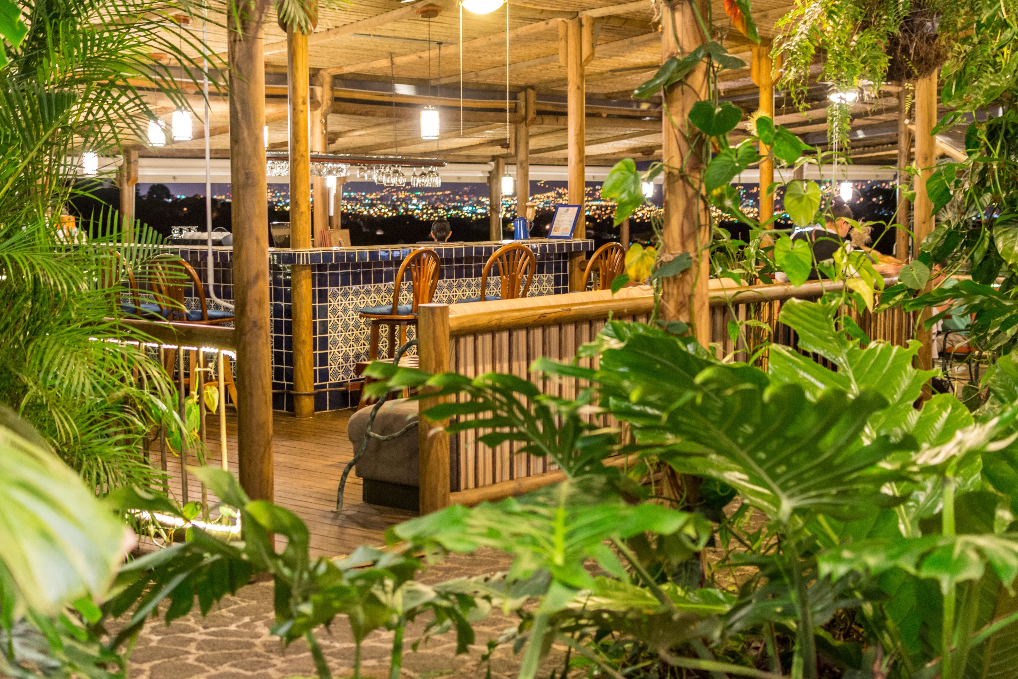 CR- Finca Rosa Blanca-view of bar & restaurant-plants.webp
