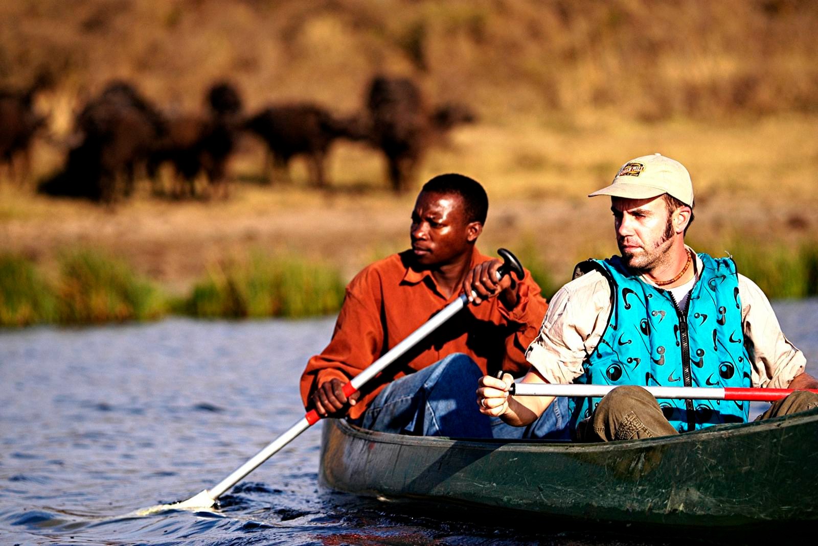 TZ_-_HAtari_Lodge_-_canoeing_with_buffalo.JPG.jpg