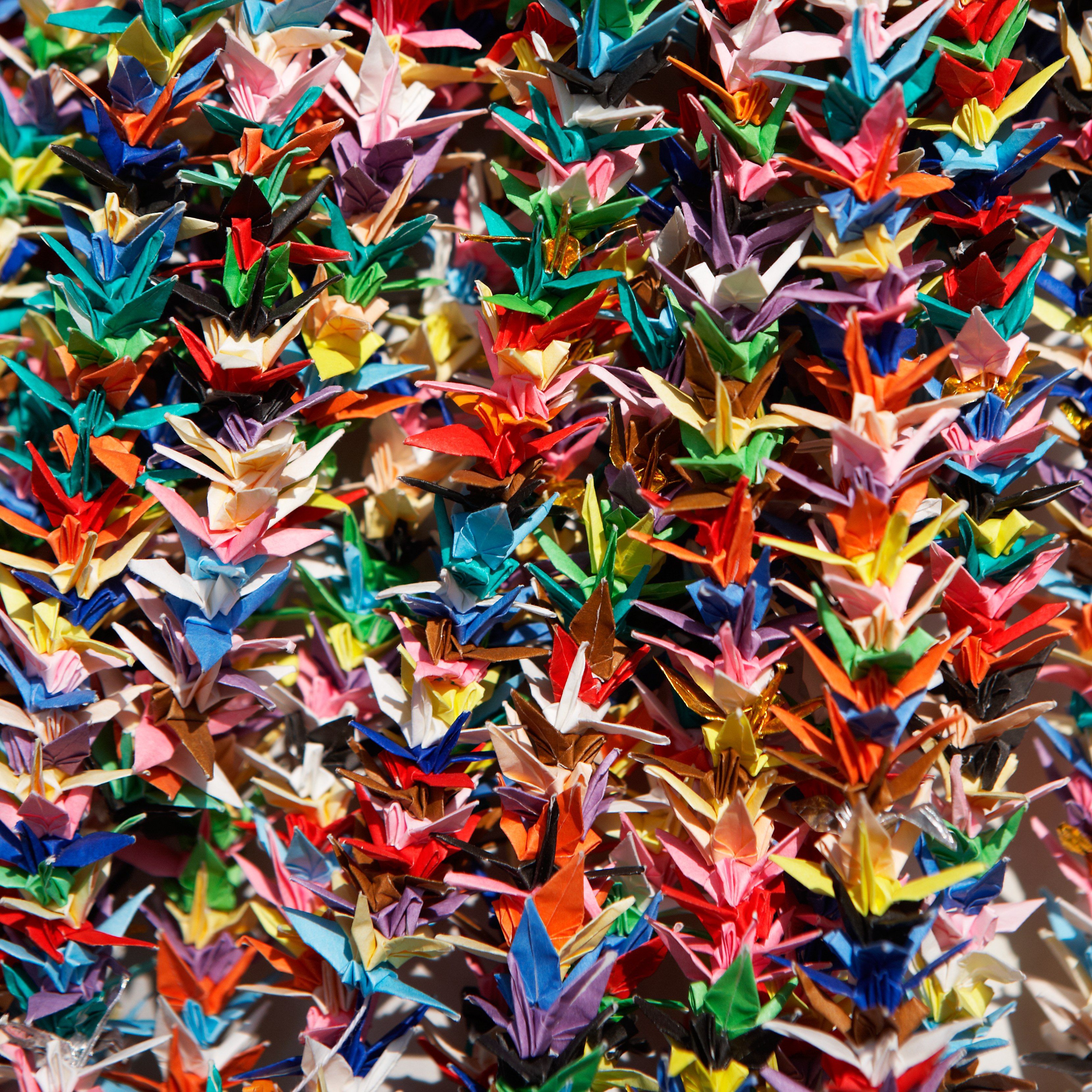 JP - Hiroshima Colorful Origami Paper Cranes Background.jpg