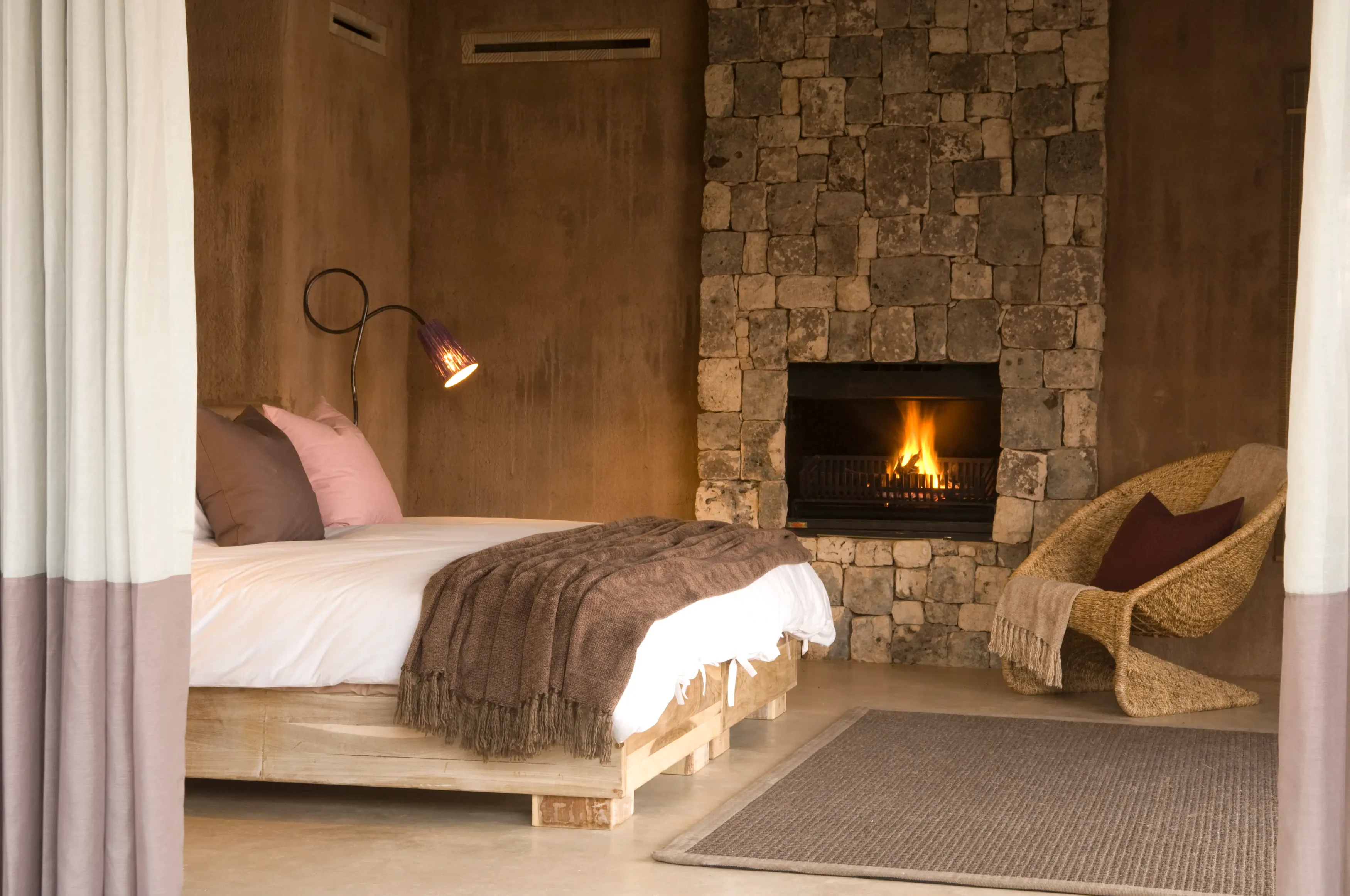 NA-Onguma The Fort-Bush Suite Bedroom.webp