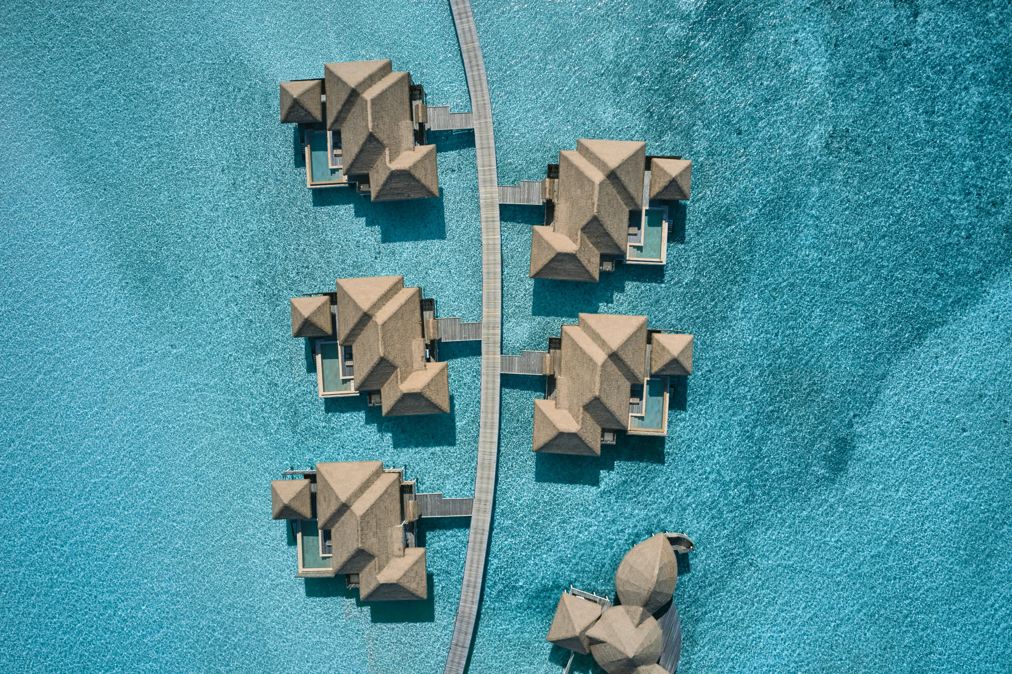 MV - COMO Maalifushi - Aerial_Water Villas (1).webp