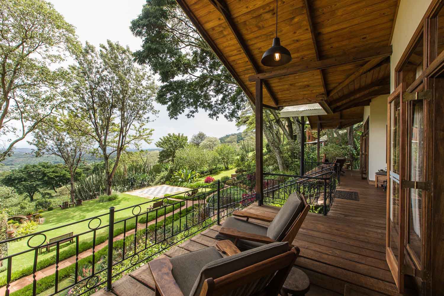 TZ-Gibbs Farm-Bustani House verandah views.jpg