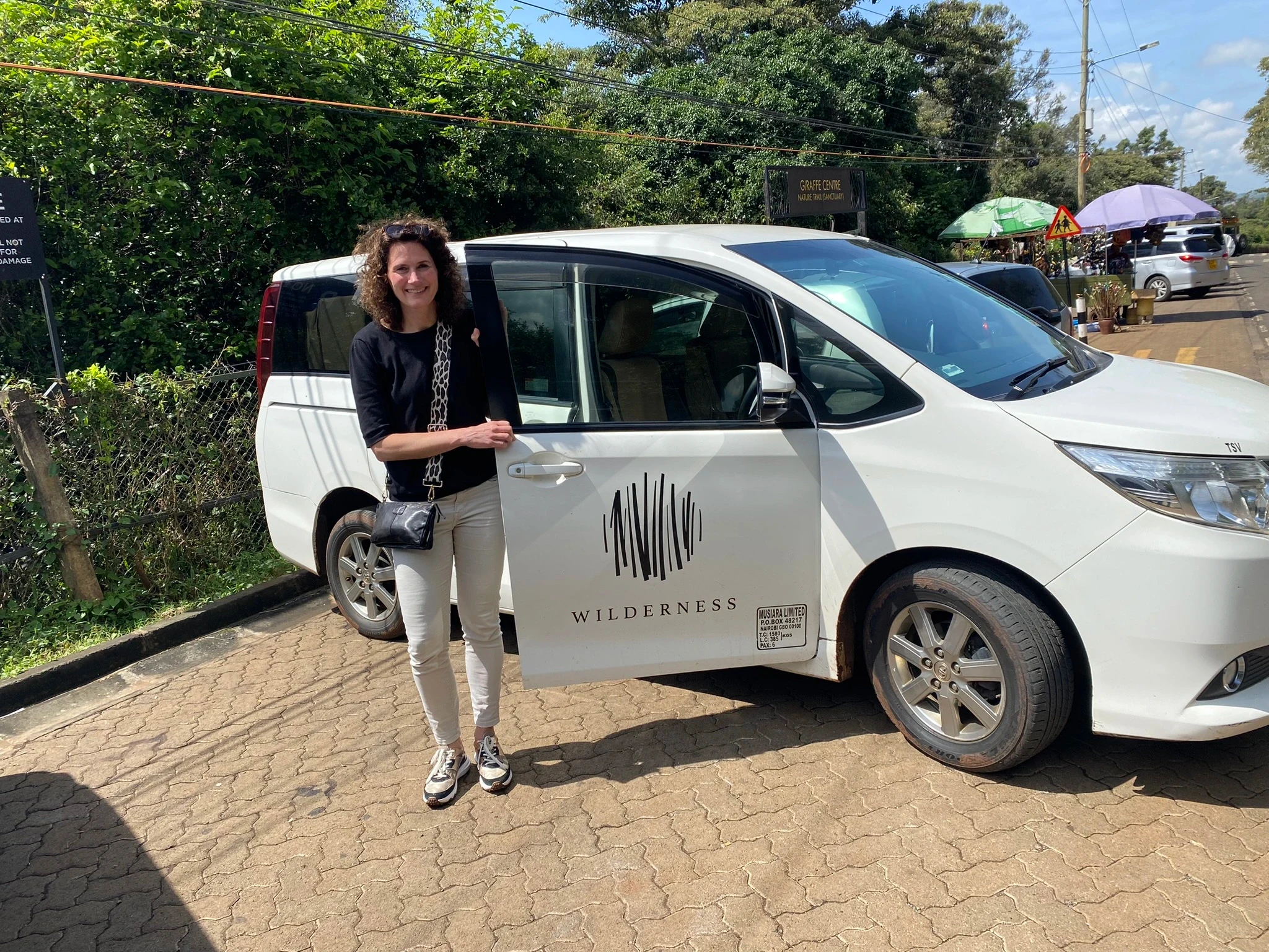KE - Seraphine at Wilderness transfer vehicle in Nairobi (1).webp