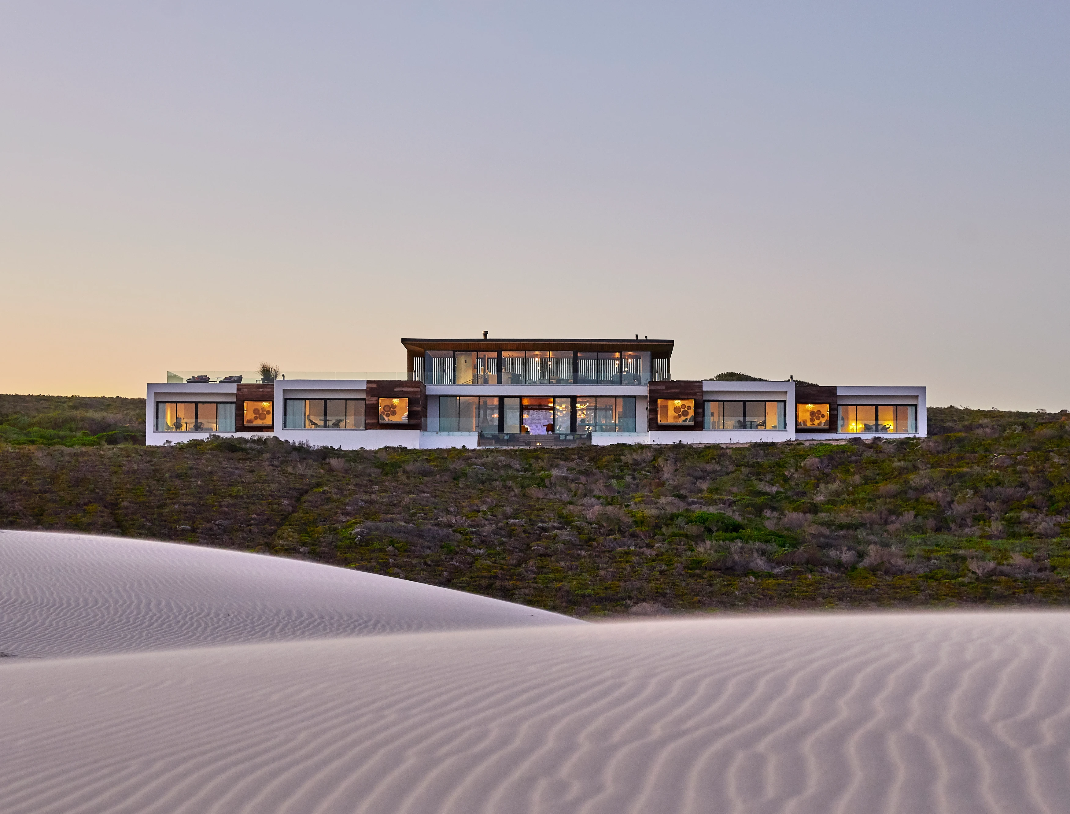 ZA-Morukuru Beach Lodge - exterior view with dunes.webp