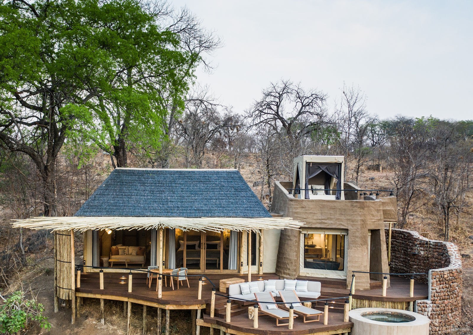 ZM-Puku Ridge-room overview with sleepout deck.jpg
