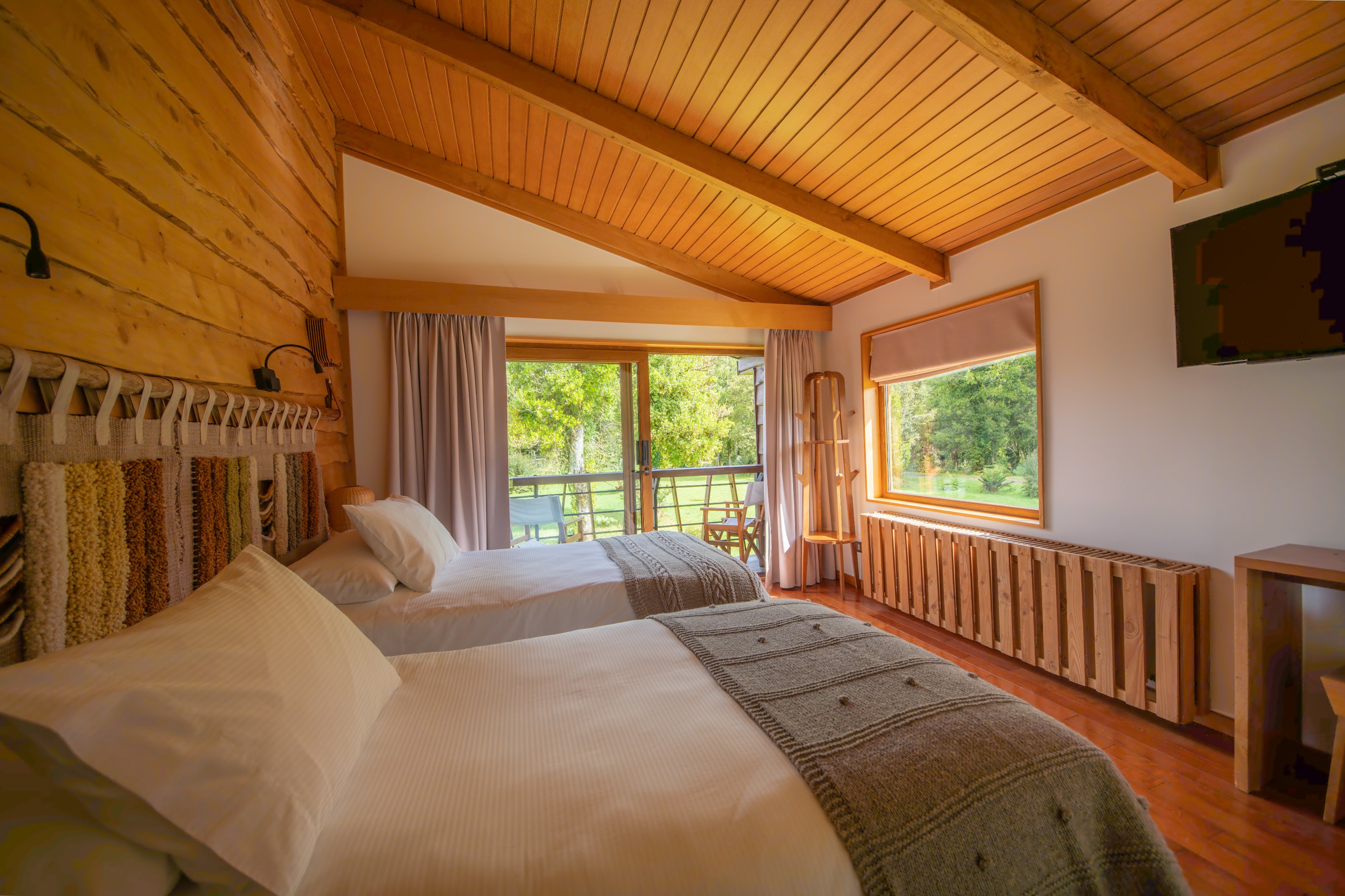 CL - Accommodatie - Melimoyu Lodge - Slapen.jpg