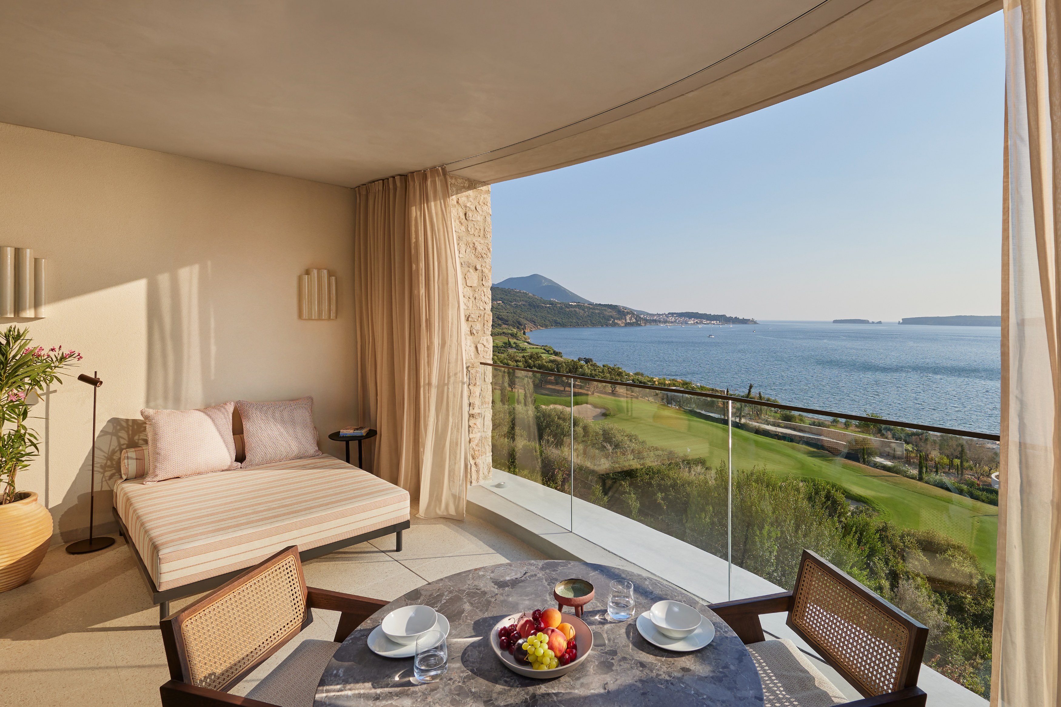GR - Mandarin Oriental, Costa Navarino - Deluxe Bay View Junior Suite Terrace.jpg