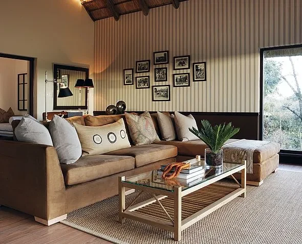 ZA-Londolozi-Pioneer_Camp_-_Lounge_of_Suite.jpg_a2172528e2.webp