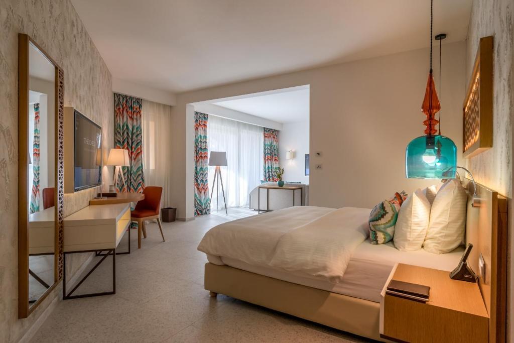 ME- The Chedi Lustica Bay- bedroom side view.jpg