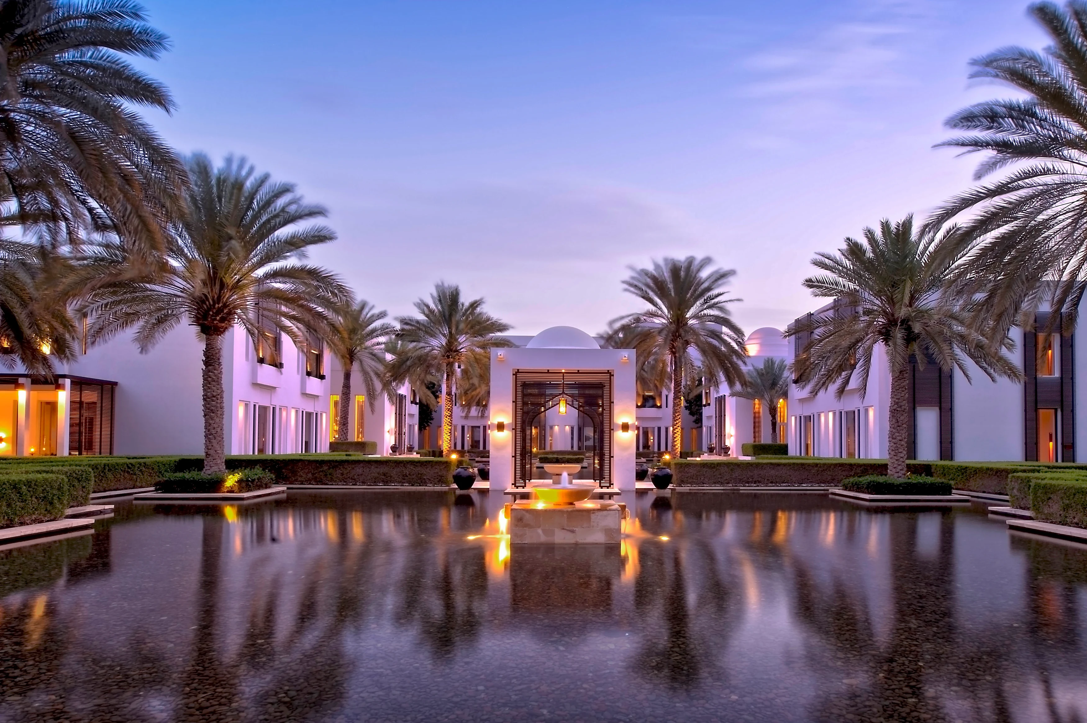 OM - The Chedi Muscat - Gardens at night.webp